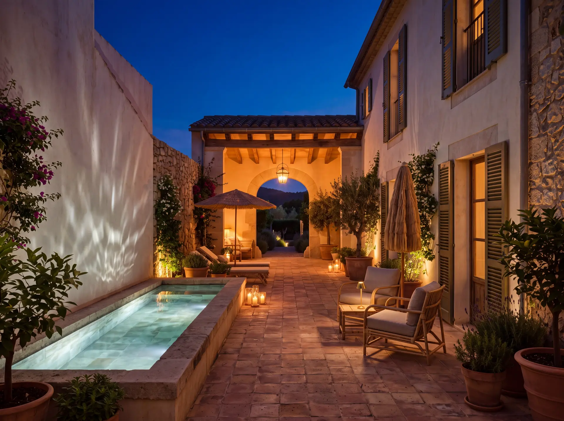 Courtyard of a Mallorcan finca hotel redirected to a warm night lighting scheme